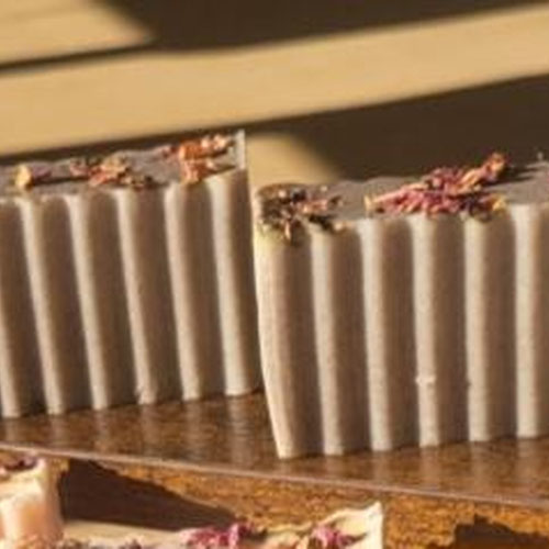 Sandlewood Goats Milk Soap Topped with Rose Petals